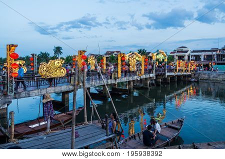 Hoi An, Vietnam - August 14, 2015: bridge over the Thu Bon river in the UNESCO World Heritage city of Hoi An.