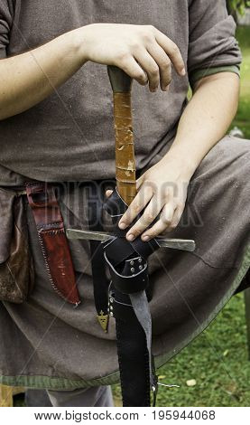 Ancient medieval sword in a knight detail of weapon of war