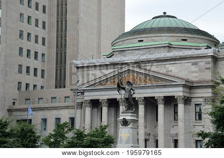 Montreal, Canada - July 26, 2014: Old Town Area With Centaur Theater And Statue Outside Notre Dame B