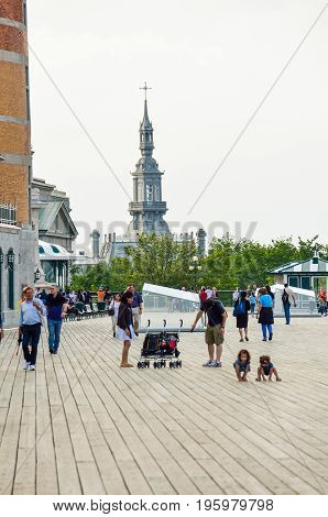Quebec City, Canada - July 27, 2014: People Walking On Dufferin Terrace Boardwalk Street Close To Ch