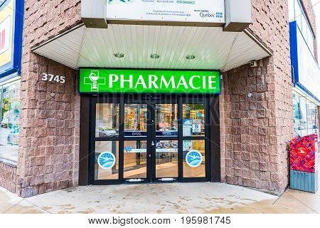 Montreal, Canada - May 26, 2017: Pharmacie Store Entrance And Sign Pharmacy In Downtown City During