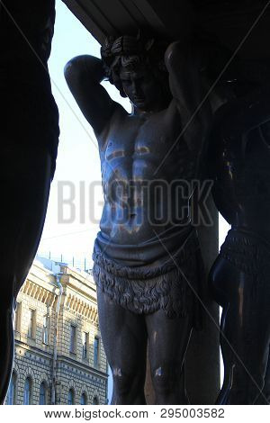 Atlant Statue In Form Of A Man Body Supporting Column Of Winter Palace In Saint Petersburg, Russia O