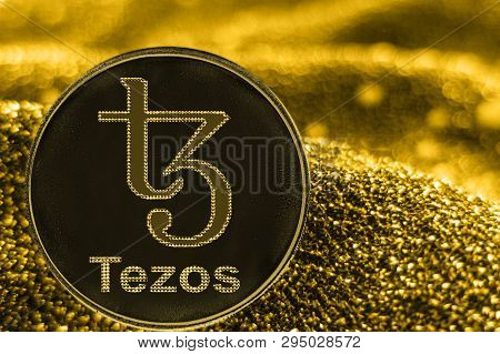 Coin Cryptocurrency Xtz Tezos And Gold Fabric Background.