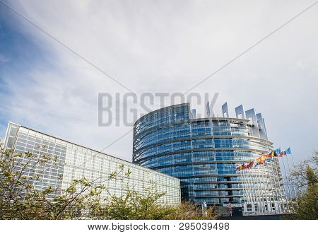 European Parliament Building With All Member States Flags Waving Useful Image For Business Articles,
