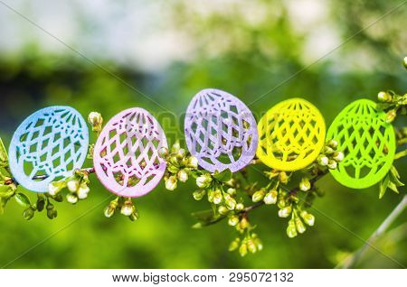 Easter Eggs Made Of Colored Felt With Flowering Branches Of Fruit Tree. Postcard, Banner For Easter.