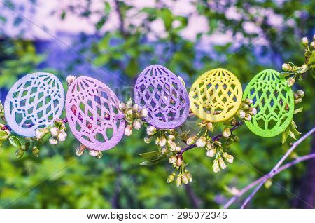 Easter Eggs Made Of Colored Felt With Flowering Branches Of Fruit Tree. Postcard, Banner For Easter.