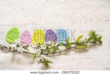 Easter Eggs Made Of Colored Felt With Flowering Branches Of Fruit Tree. Postcard, Banner For Easter.