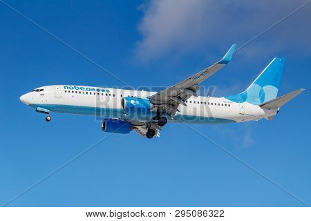 Moscow, Russia - March 26, 2019: Aircraft Boeing 737-81d(wl) Vq-bte Of Pobeda Airline Against Blue S