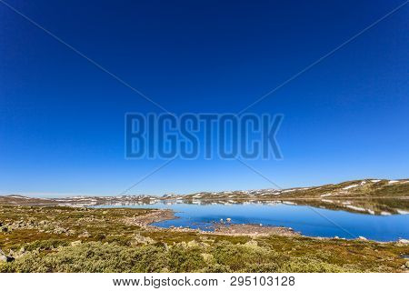 Hardangervidda Mountain Plateau Landscape. National Tourist Hardangervidda Route. Norway In Summer.