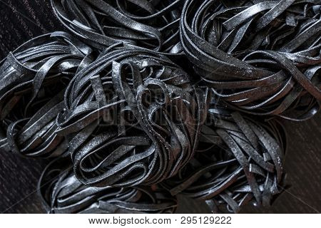 Black Pasta With Cuttlefish Ink. Pasta Of Durum Wheat Semolina With Squid Ink