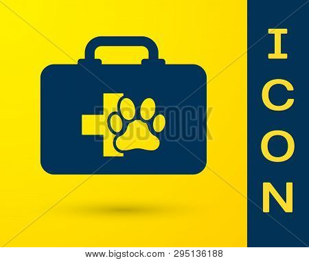 Blue Pet First Aid Kit Icon Isolated On Yellow Background. Dog Or Cat Paw Print. Clinic Box. Vector 