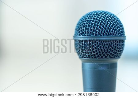 Interview: Black Microphone Is Standing On The Desk, Copy Space.