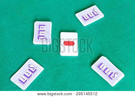 Moscow, Russia - April 3, 2019: Decks Of Set Card Game On Green Baize Table. Set Is Real-time Card G