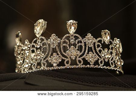 Luxury crown with diamonds, diadem jewelry, on black background