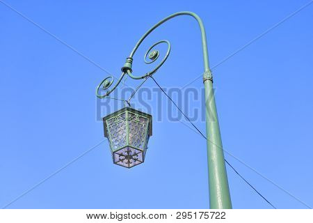 Street Lamp In The Old Style On Blue Ssky Background In St.petersburg, Russia.