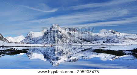 Alpine landscape reflexion in Lofoten Archipelago, Norway, Europe