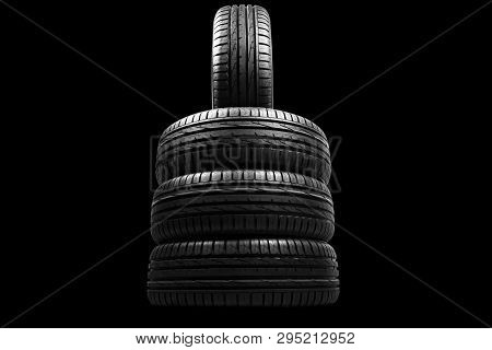 Car Tire Isolated On Black Background. Tire Stack. Car Tyre Protector Close Up. Black Rubber Tire. B