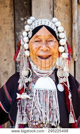 CHIANG RAI, THAILAND- FEBRUARY 2019 : Daily lives of women in a white karen village, a subgroup of the Karen hilltribe in a small village near Chiang Rai, Thailand