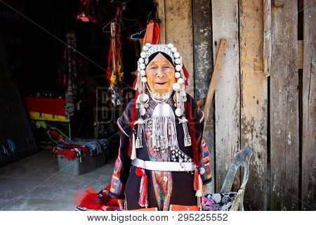 CHIANG RAI, THAILAND- FEBRUARY 2019 : Daily lives of women in a white karen village, a subgroup of the Karen hilltribe in a small village near Chiang Rai, Thailand