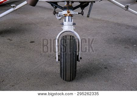 Landing Gear Close Up, Light Sport Aicraft Wheel, Front View Of Damper And Wheel