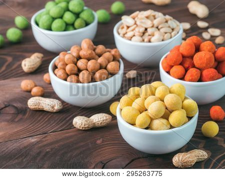 Assortment Of Different Peanuts Snack For Beer, Wine, Party Bar. Salted Peanuts, Peanuts In Coconut 