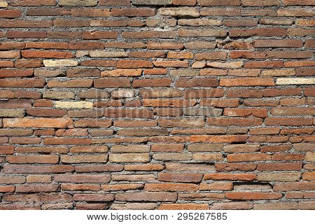 Old Red Brick Wall Texture Background With Scratches, Cracks, Dust, Crevices, Roughness. 
Grungy Wid