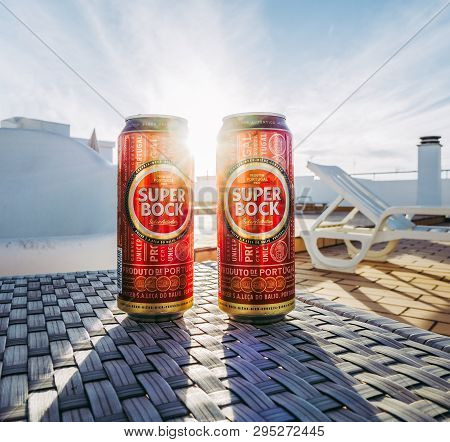 Lisbon, Portugal - August 1, 2017: Two Super Bock Beer Cans With Sun Shining Between Them.