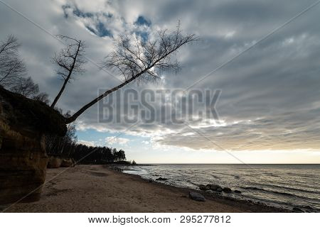 Limestone Beach At The Baltic Sea With Beautiful Sand Pattern And Vivid Red And Orange Color - Touri