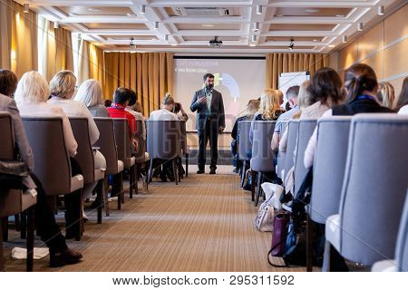 Speaker Giving A Talk At Conference, Presentation, Business Event. Audience At The Conference Hall.