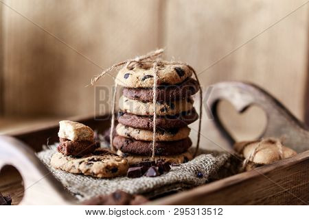 Chocolate Cookies On Wooden Rustic Table. Homemade Cookies. Stack Of Tasty Chocolate Cookies