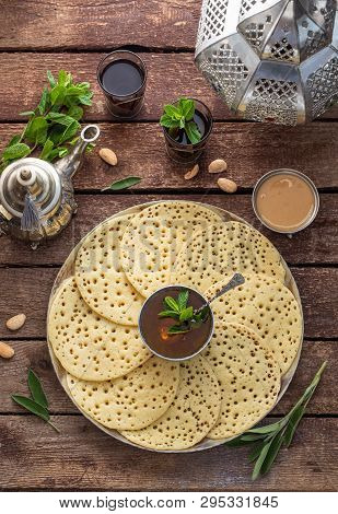 Top View Of Moroccan Pancakes With Mint Tea