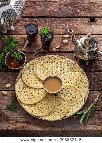 Baghrir With Honey, Almond Sauce And Mint Tea