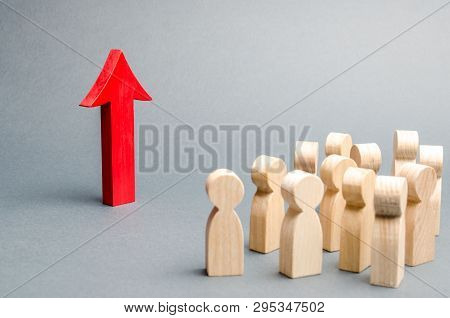 A Crowd Of People Looking At The Red Arrow Up. Growth And Development, Self-development. Raising Wor