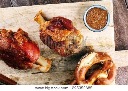 Traditional German Cuisine, Schweinshaxe Roasted Ham Hock And Pretzels