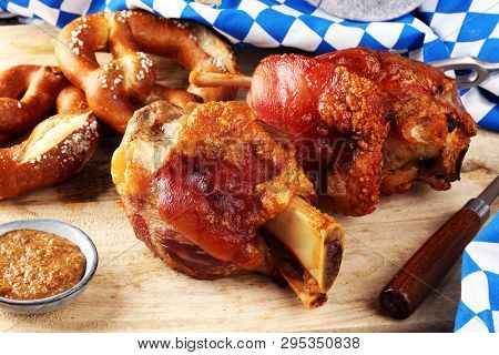 Traditional German Cuisine, Schweinshaxe Roasted Ham Hock And Pretzels