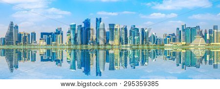Banner Of Capital City Of Qatar. Doha West Bay Skyline Reflecting In Doha Bay. Panorama Of Glassed S