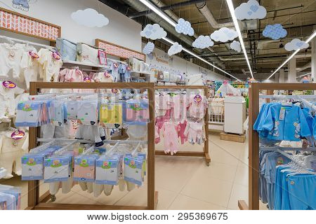 Minsk, Belarus - March 26, 2018: View Of The Toodlers Clothes Section With Brigt And Colorful Bodysu