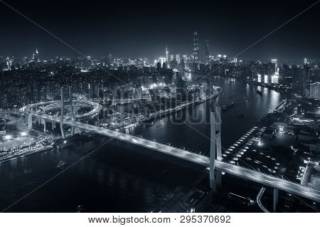 Shanghai Nanpu Bridge over Huangpu River with busy traffic in China.