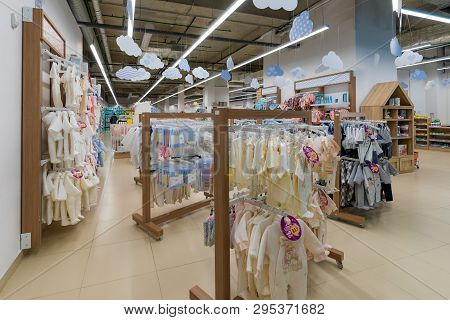 Minsk, Belarus - March 26, 2018: View Of The Toodlers Clothes Section With Brigt And Colorful Bodysu