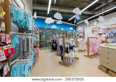 Minsk, Belarus - March 26, 2018: View Of The Toodlers Clothes Section With Brigt And Colorful Bodysu