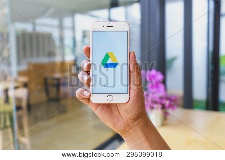 Chiang Mai, Thailand - Mar 02,2018: Man Holding Apple Iphone 6s Rose Gold With Google Drive Apps On 