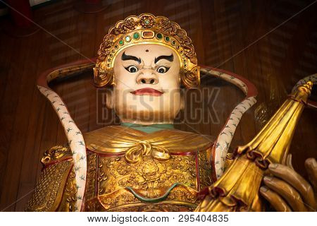 Giant Guarding The Door Or Watching The Giant Doors At Leng Noei Yi Or Wat Kamalawat Yaowarat In Chi