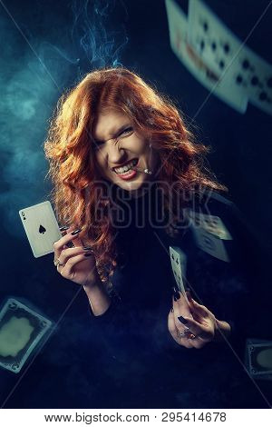 The Red-haired Fortune-teller Smokes A Cigar And Predicts The Future, Laughs, Throws Cards. Queen Of