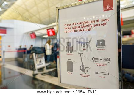 HONG KONG, CHINA - CIRCA FEBRUARY, 2019: close up shot of a plate at Emirates check-in area in Hong Kong International Airport.