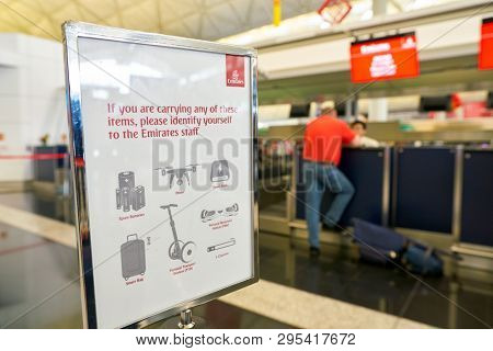HONG KONG, CHINA - CIRCA FEBRUARY, 2019: close up shot of a plate at Emirates check-in area in Hong Kong International Airport.
