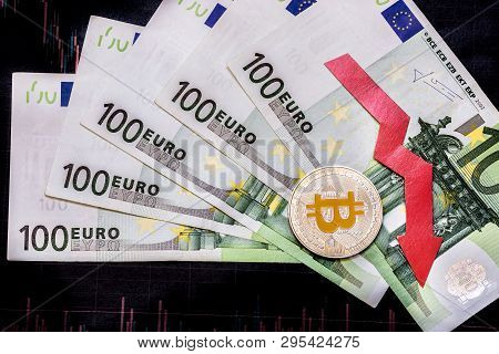 Unprofitable Investment Of Depreciation Of Virtual Money Bitcoin. Red Arrow, Silver Bitcoin And Euro