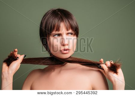 Aggressive Pretty Woman. Hostile Facial Expression. Closeup Portrait Of Emotional Lady Pulling Aside
