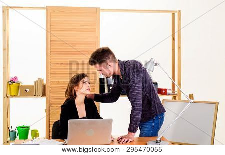 Falling In Love In Office. Workplace Romance Of Handsome Man And Sexy Woman In Office. Couple In Lov