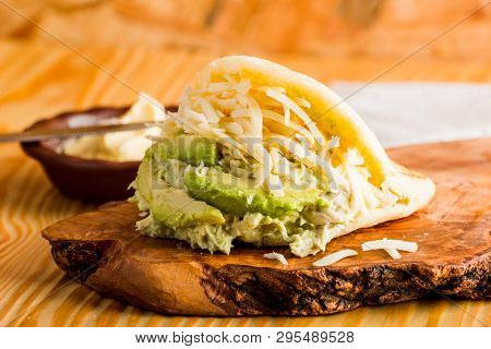 Typical Latin American Food, Arepa For Breakfast With Cheese, Avocado And Chicken