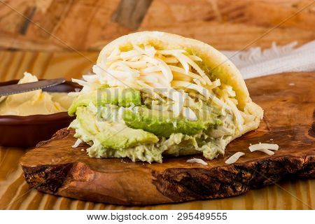 Typical Latin American Food, Arepa For Breakfast With Cheese, Avocado And Chicken